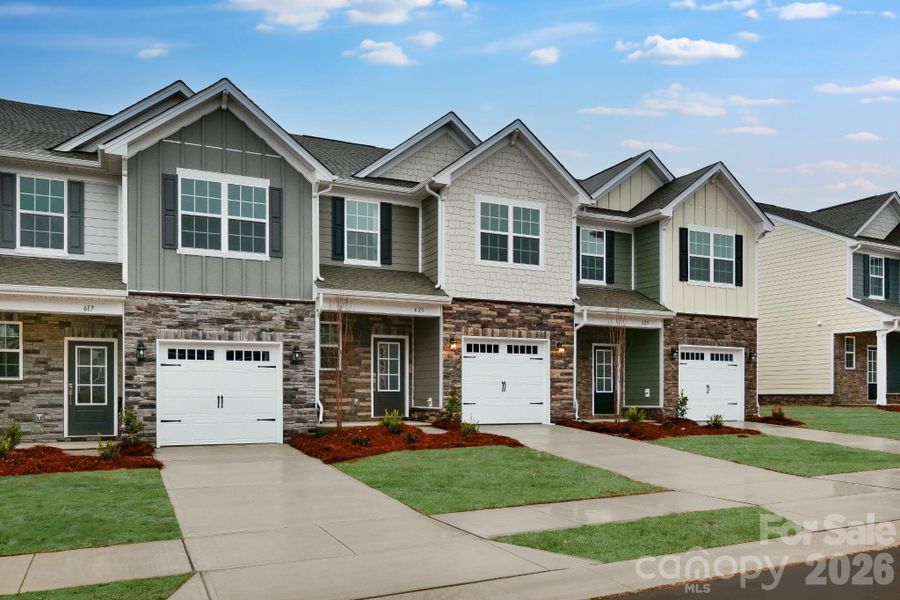 Front exterior of a new home in Cannon Village, York, SC, highlighting curb appeal (Image 20). Front exterior of a new home in Cannon Village, York, SC, highlighting curb appeal (Image 20).