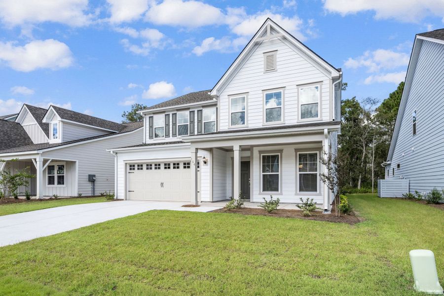 Front exterior of a new home in Waterways, Richmond Hill, GA, highlighting curb appeal (Image 28).