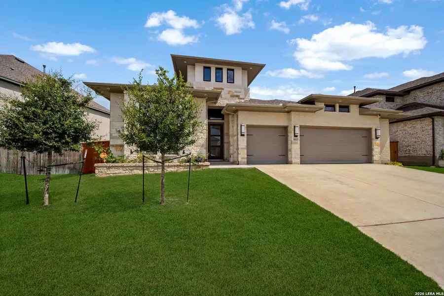 Front exterior of a new home in Ladera, San Antonio, TX, highlighting curb appeal (Image 26). Front exterior of a new home in Ladera, San Antonio, TX, highlighting curb appeal (Image 26).