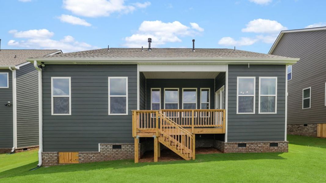 Exterior details and patio area of a home in Sunset Summits, Spartanburg (Image 24).
