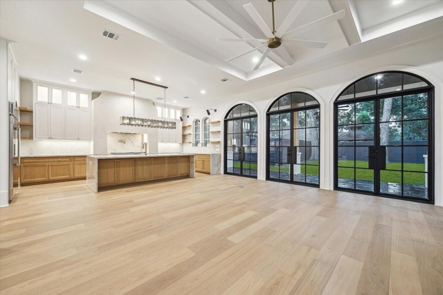 Kitchen is open to living creating the perfect ambiance for entertaining*Picture is of a recently constructed home by the builder.  1519 Candlelight will be similar in quality, but these pictures are not meant to be an exact representation of the new home. Specs of home may change at sole discretion of the seller.