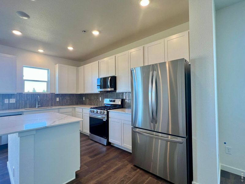 Furnished interior view inside a new home in Union Colony West, Greeley (Image 7).