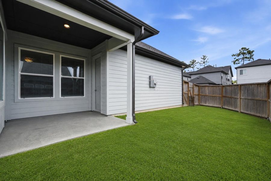 Exterior details and patio area of a home in The Groves 35', Humble (Image 22).