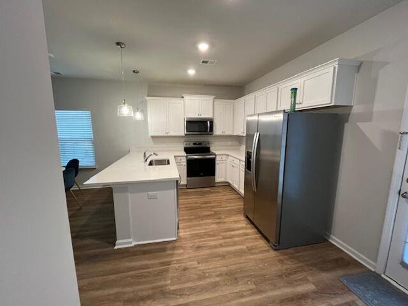 Furnished interior view inside a new home in , Summerville (Image 12).