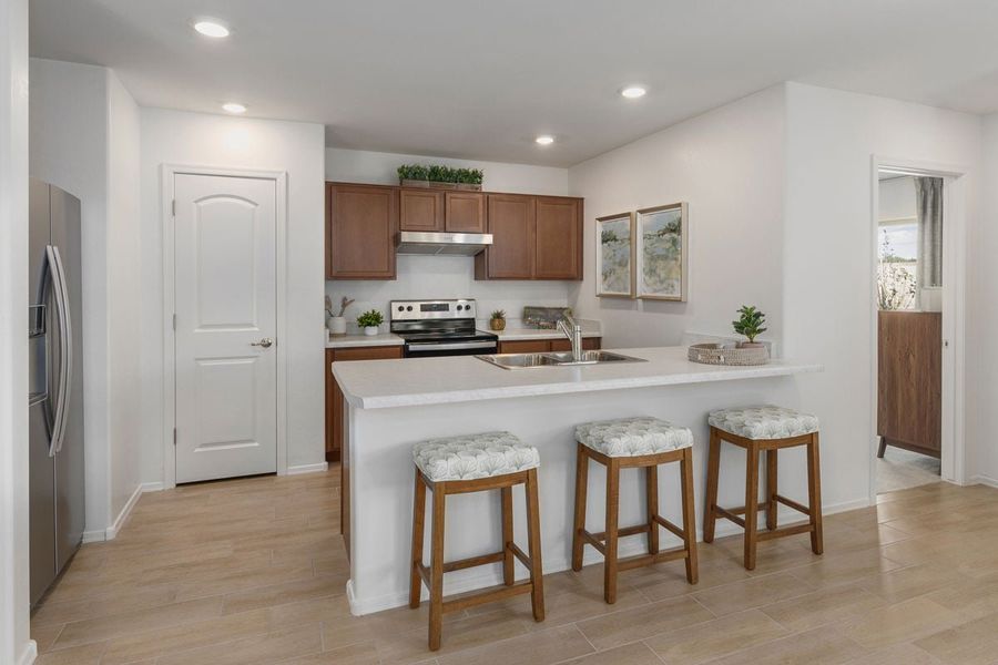 Representative furnished interior of a home built from the 1383 Modeled by KB Home in Mirador Ridge Blossom, Tucson (Image 6).