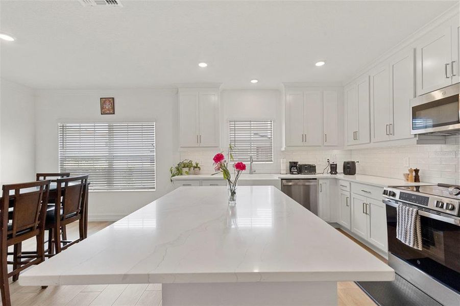 Furnished interior view inside a new home in Townes at Manhattan Crossing, Tampa (Image 38).