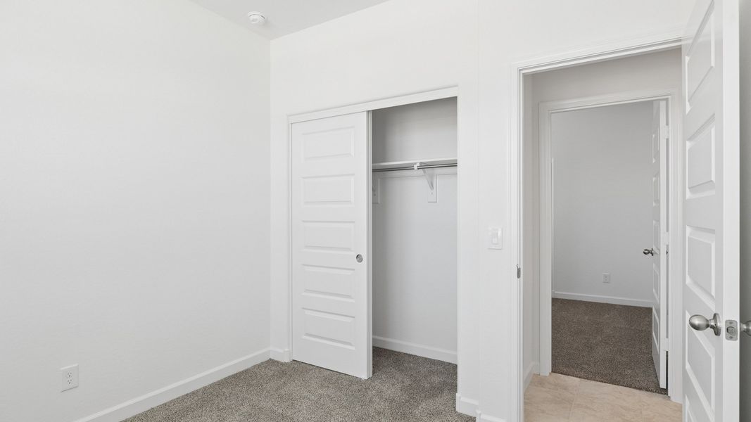 Representative unfurnished interior of a home built from the Raven by D.R. Horton in Magma Ranch Vistas, Florence (Image 15).