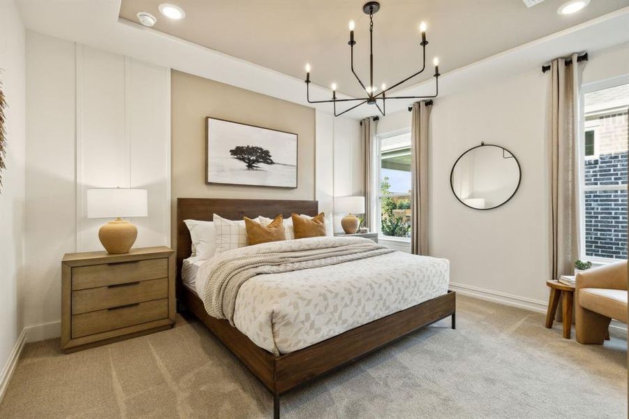 *Model Representation - Spacious owner's suite with private bath