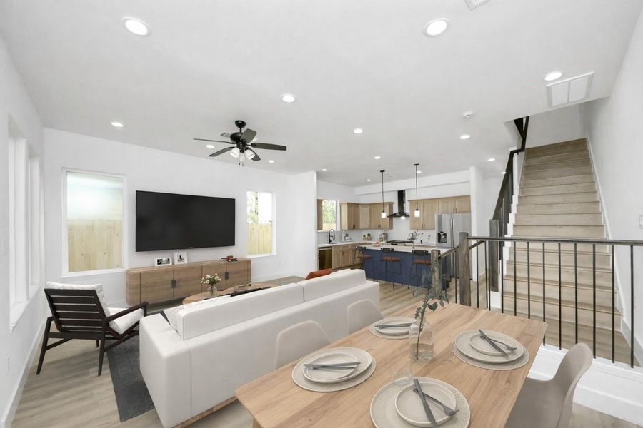 Bright and inviting living space with abundant natural light, an open layout, and seamless access to the backyard—perfect for relaxing or entertaining.