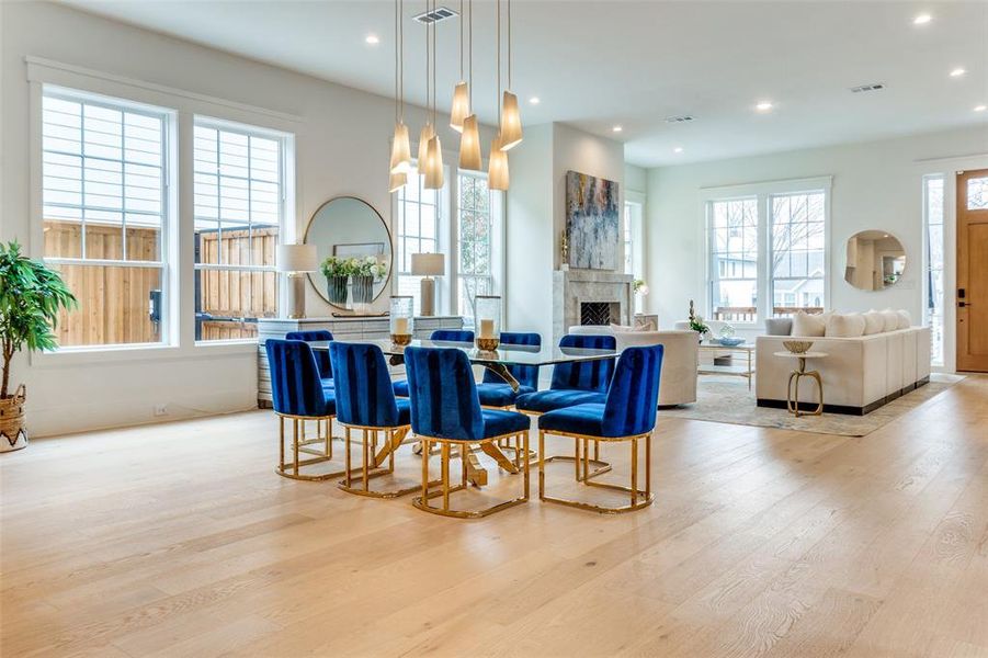 Dining area featuring a healthy amount of sunlight and light hardwood / wood-style floors