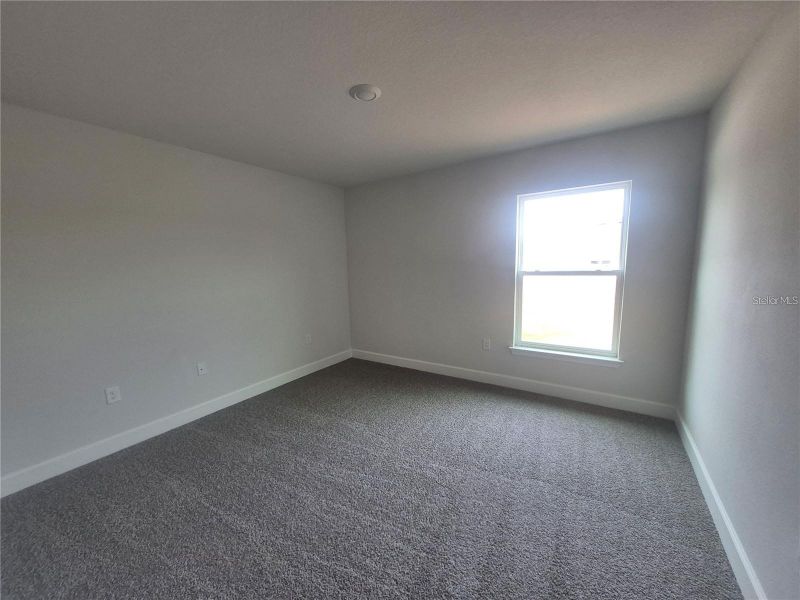 Spacious, unfurnished interior of a new home in Hill Country Estates, Dade City (Image 16).