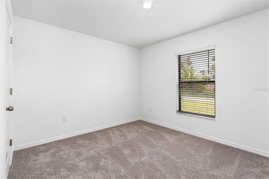 Spacious, unfurnished interior of a new home in , Port Charlotte (Image 10).