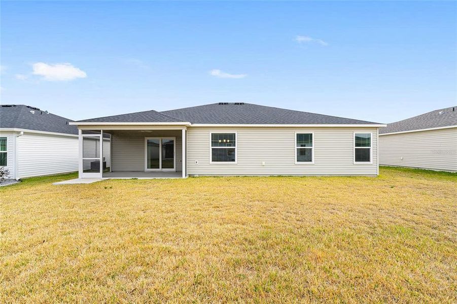 Exterior details and patio area of a home in , The Villages (Image 4). Exterior details and patio area of a home in , The Villages (Image 4).