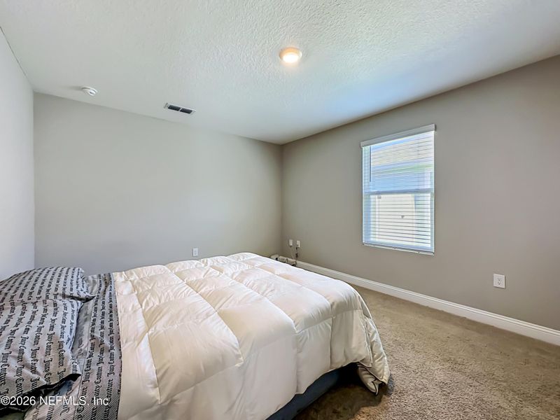 Furnished interior view inside a new home in Dorado at Entrada, St. Augustine (Image 13).