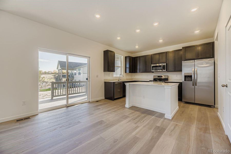 Furnished interior view inside a new home in Ken-Caryl Ranch: The Pioneer Collection, Littleton (Image 4).
