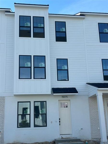 Exterior details and patio area of a home in Parkview at Hamlin, Winter Garden (Image 2). Exterior details and patio area of a home in Parkview at Hamlin, Winter Garden (Image 2).