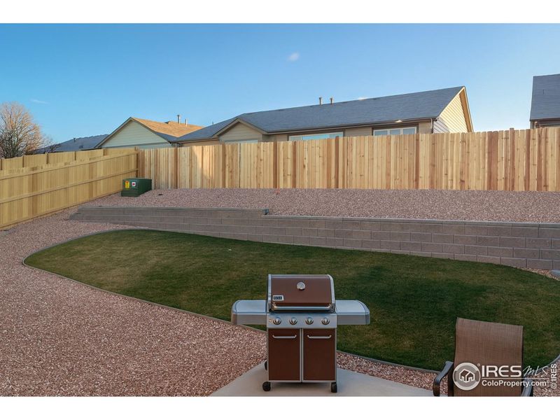 Exterior details and patio area of a home in Highlands Preserve, Mead (Image 3).