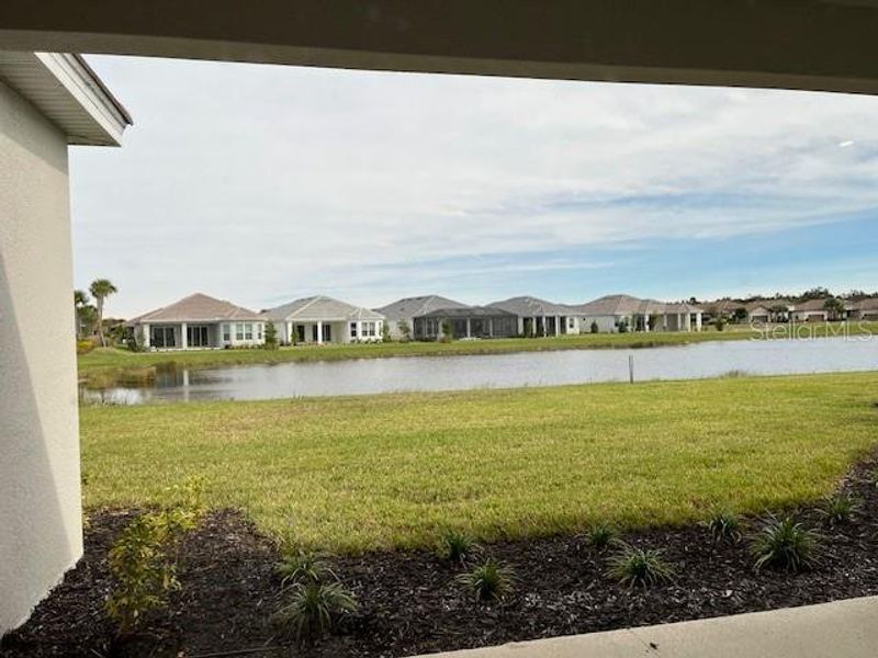 Exterior details and patio area of a home in Esplanade at Skye Ranch, Sarasota (Image 2).