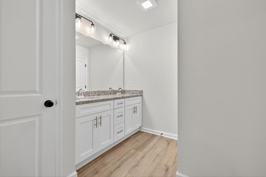 Furnished interior view inside a new home in Medlock Park, Austell (Image 12).