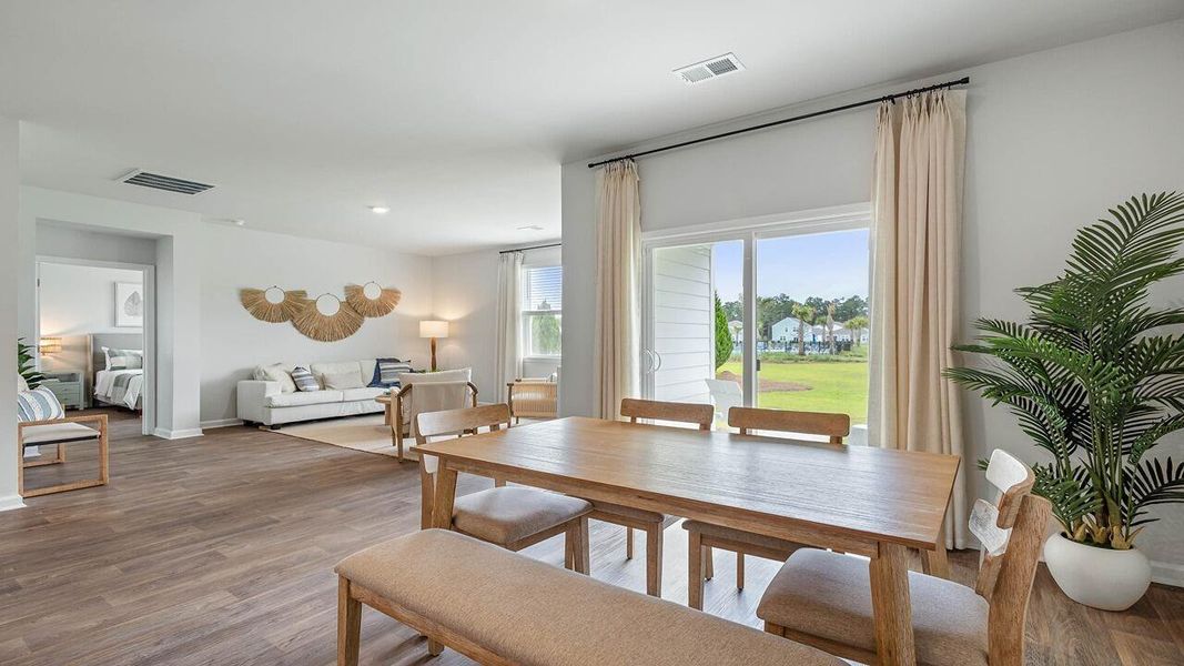 Furnished interior view inside a new home in Pine Hills at Cane Bay, Summerville (Image 10). Furnished interior view inside a new home in Pine Hills at Cane Bay, Summerville (Image 10).