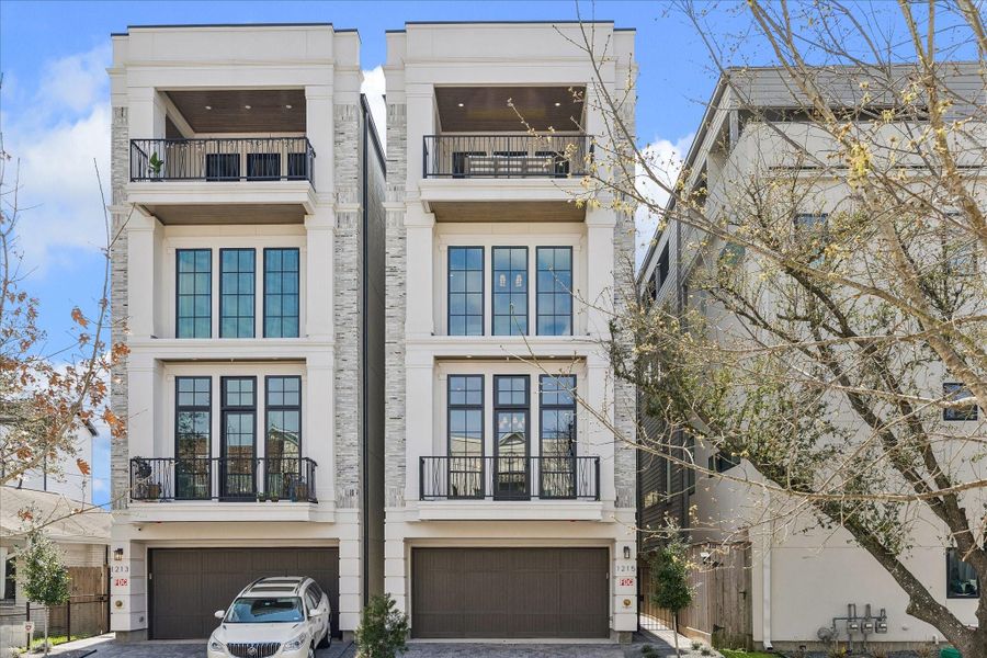 Exceptional materials combine with unrivaled craftsmanship in this remarkable home from the 2024 GHBA Custom Builder of the Year, Fifty Seventh & 7th Luxury Homes.The lavish living room, complete with custom built-ins, stacked stone fireplace, and floor-to-ceiling windows. Twelve-foot ceilings, elegant crown moulding, and understated chandelier by Ziba create warmth and elegance.