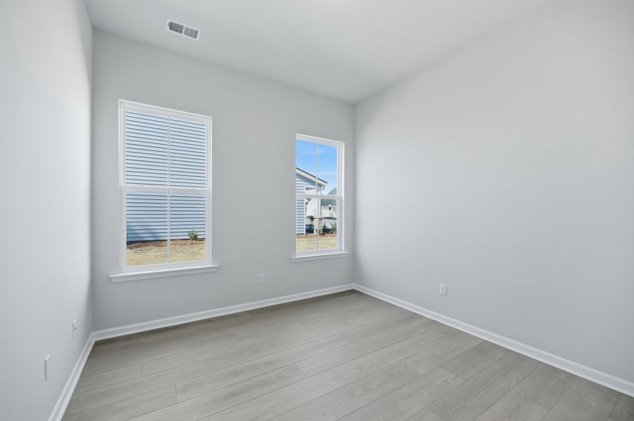 Spacious, unfurnished interior of a new home in Horizons at Summers Corner | 55+, Summerville (Image 24).