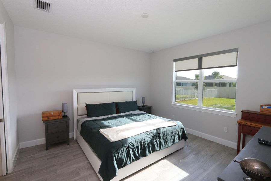 Furnished interior view inside a new home in Del Webb Tradition, Port St. Lucie (Image 28).