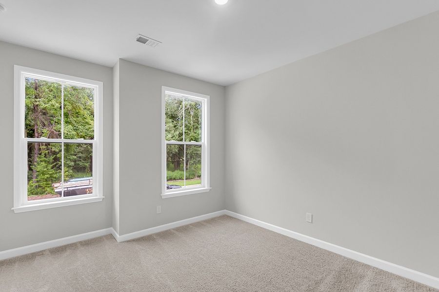 Spacious, unfurnished interior of a new home in Pineland Preserve, Summerville (Image 31).