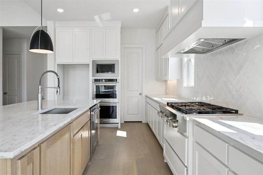 Featuring tons of storage and fantastic finishes, the kitchen of your dreams awaits! Featuring tons of storage and fantastic finishes, the kitchen of your dreams awaits!