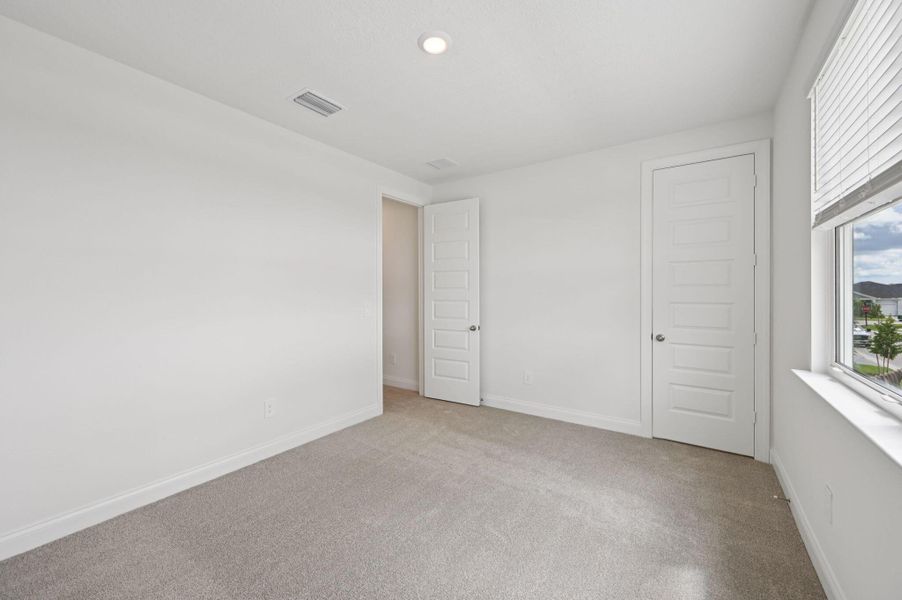 Spacious, unfurnished interior of a new home in Brystol at Wylder - Reserve Series, Port St. Lucie (Image 24).