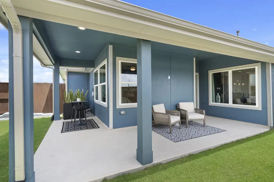 Exterior details and patio area of a home in Meridiana, Manvel (Image 3).