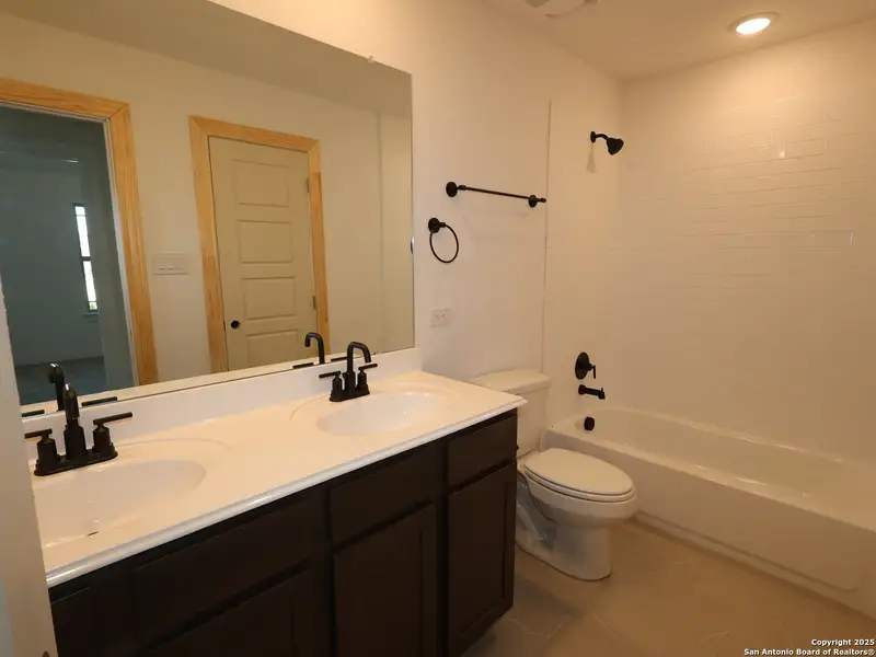 Furnished interior view inside a new home in Everly Estates, San Antonio (Image 8).