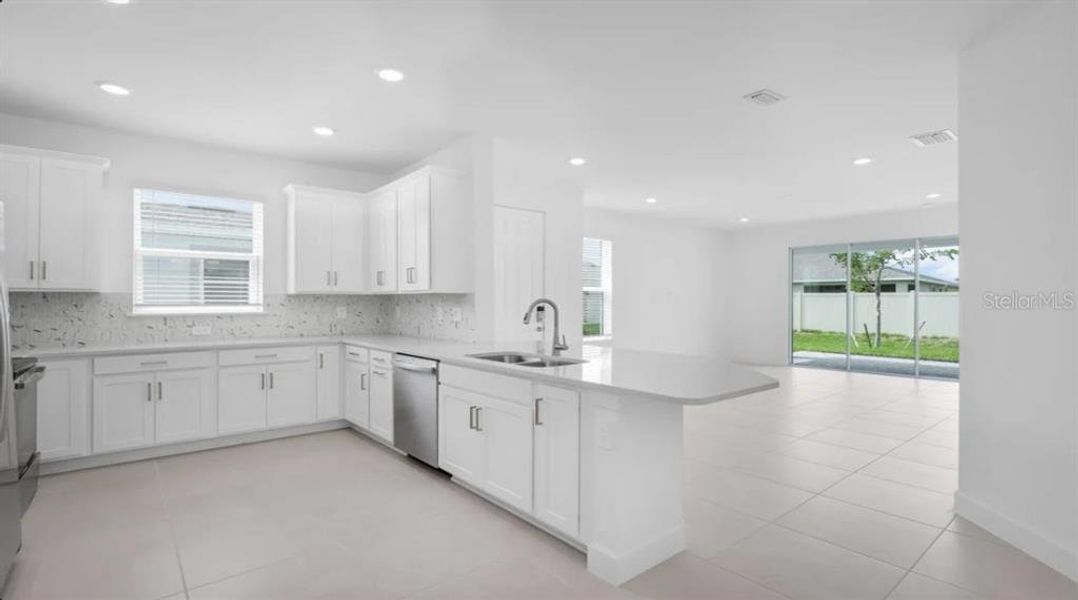 Furnished interior view inside a new home in The Cove at West Port, Port Charlotte (Image 8).