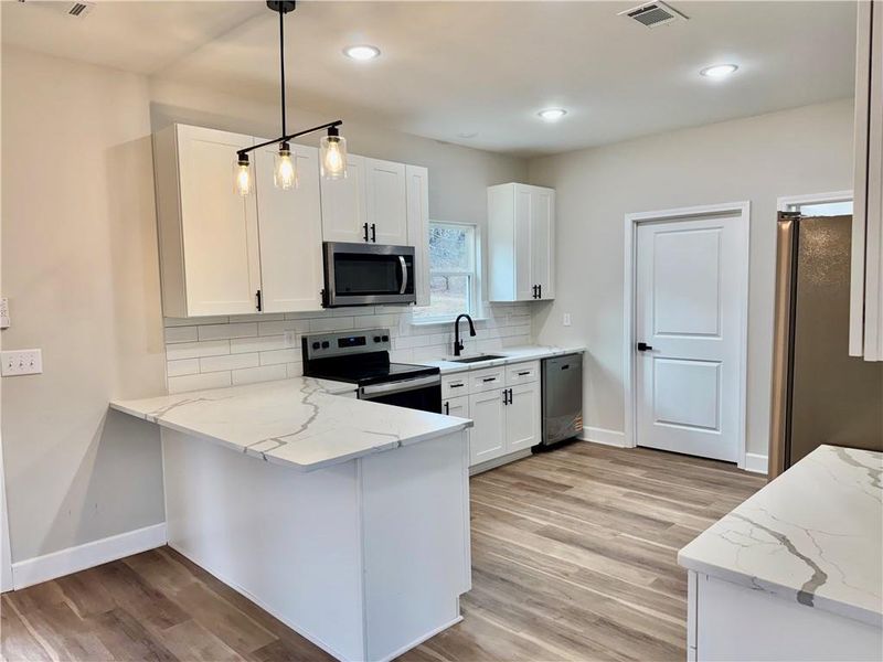Furnished interior view inside a new home in , Gainesville (Image 8).