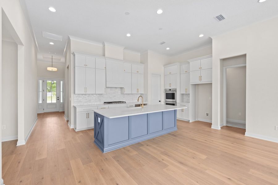 Representative furnished interior of a home built from the Aurora by Riverside Homes in Hidden Creek at SilverLeaf, St. Augustine (Image 10).