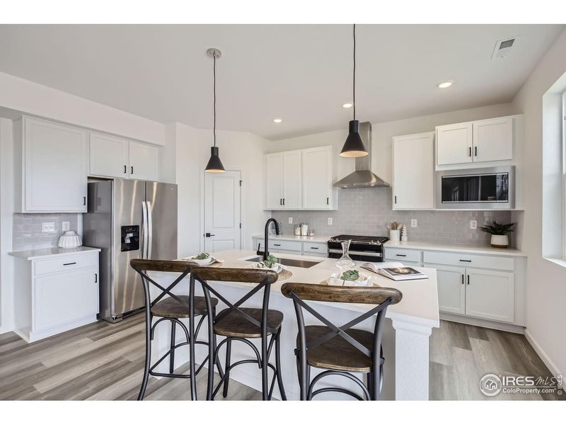 Furnished interior view inside a new home in Farmstead, Berthoud (Image 16). Furnished interior view inside a new home in Farmstead, Berthoud (Image 16).