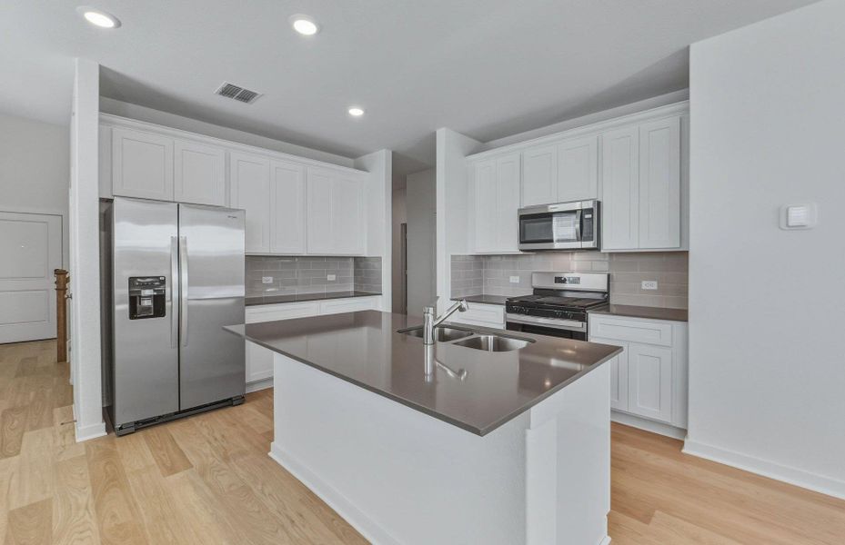 Furnished interior view inside a new home in Sunfield, Buda (Image 5). Furnished interior view inside a new home in Sunfield, Buda (Image 5).