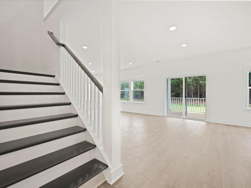 Spacious, unfurnished interior of a new home in The Coves at Lakes of Cane Bay, Summerville (Image 20). Spacious, unfurnished interior of a new home in The Coves at Lakes of Cane Bay, Summerville (Image 20).