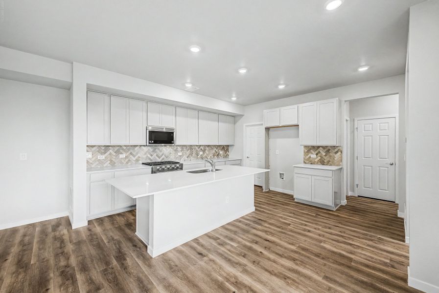Furnished interior view inside a new home in Painted Prairie, Aurora (Image 9).