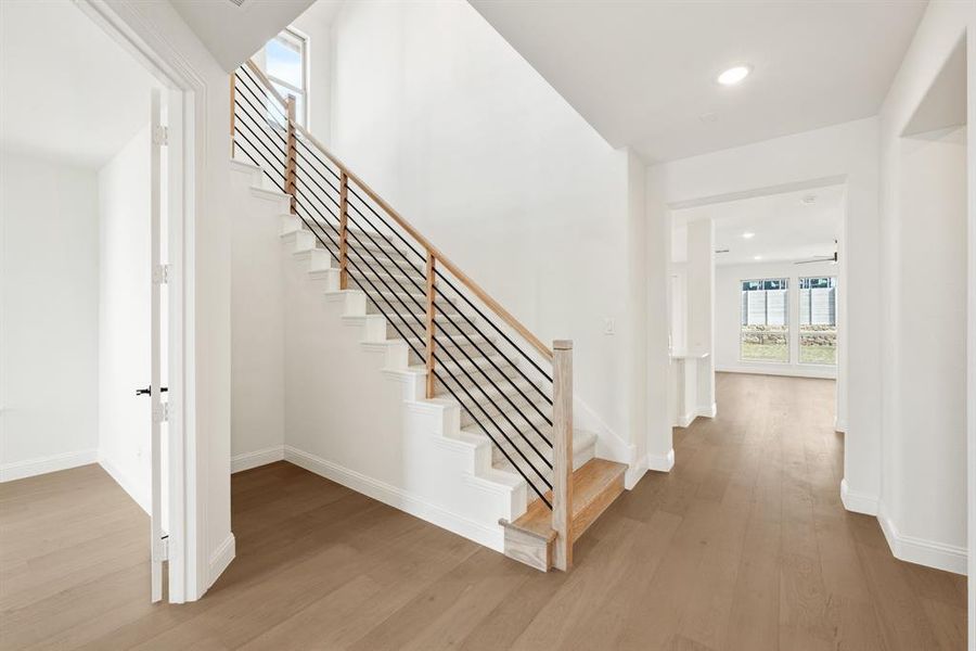 Spacious, unfurnished interior of a new home in Painted Tree Woodland District 50, McKinney (Image 18).
