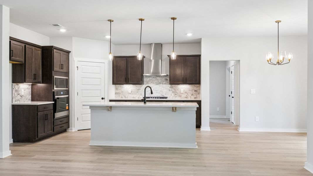 Representative furnished interior of a home built from the Ansley by D.R. Horton in Harvest Point, Spring Hill (Image 8).