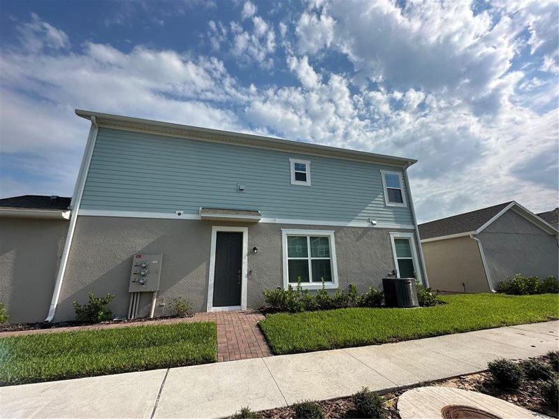 Front exterior of a new home in , Winter Garden, FL, highlighting curb appeal (Image 17). Front exterior of a new home in , Winter Garden, FL, highlighting curb appeal (Image 17).