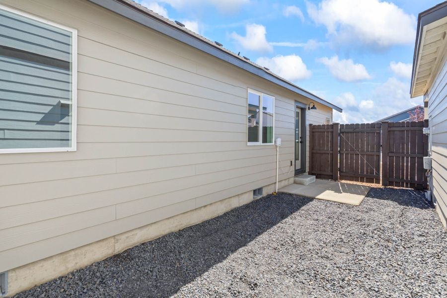 Exterior details and patio area of a home in Feather Ridge, Redmond (Image 3). Exterior details and patio area of a home in Feather Ridge, Redmond (Image 3).