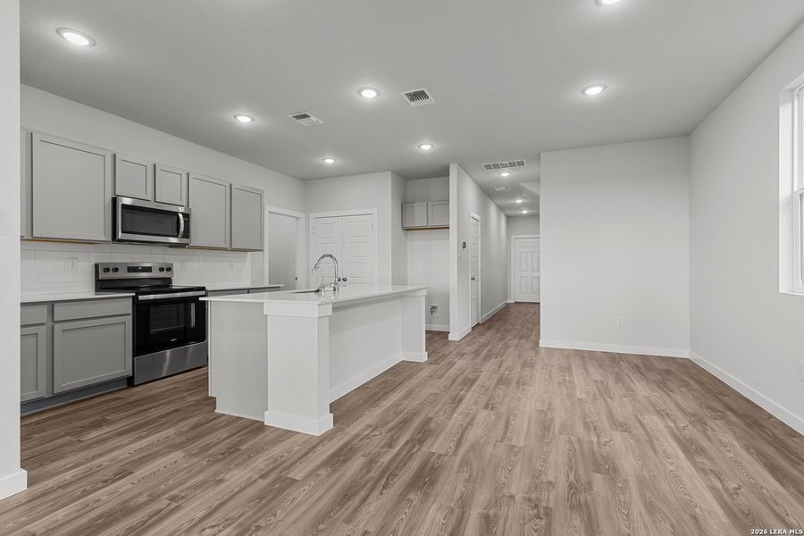 Furnished interior view inside a new home in Hacienda, San Antonio (Image 6).