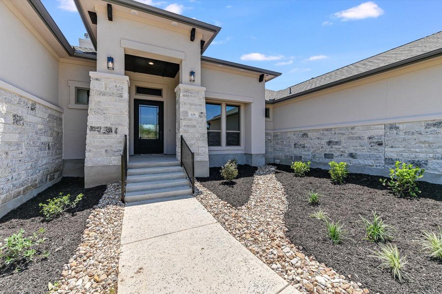 Exterior details and patio area of a home in ClearWater Ranch, Liberty Hill (Image 21). Exterior details and patio area of a home in ClearWater Ranch, Liberty Hill (Image 21).