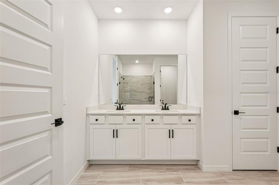 Furnished interior view inside a new home in Oakfield Trails - Signature Series, Parrish (Image 17).