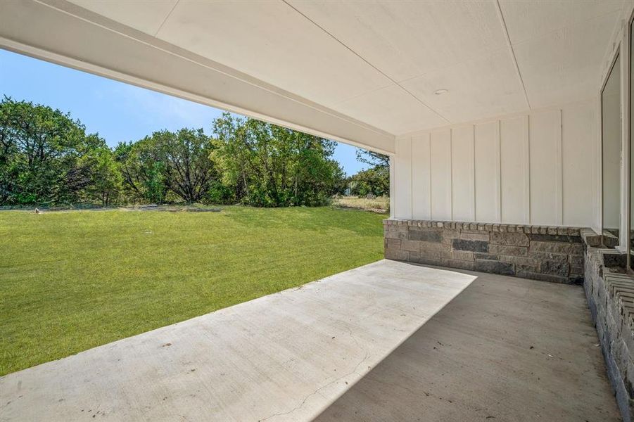 View of yard with a patio