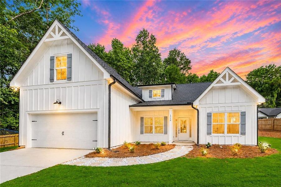 Front exterior of a new home in , Cumming, GA, highlighting curb appeal (Image 1). Front exterior of a new home in , Cumming, GA, highlighting curb appeal (Image 1).