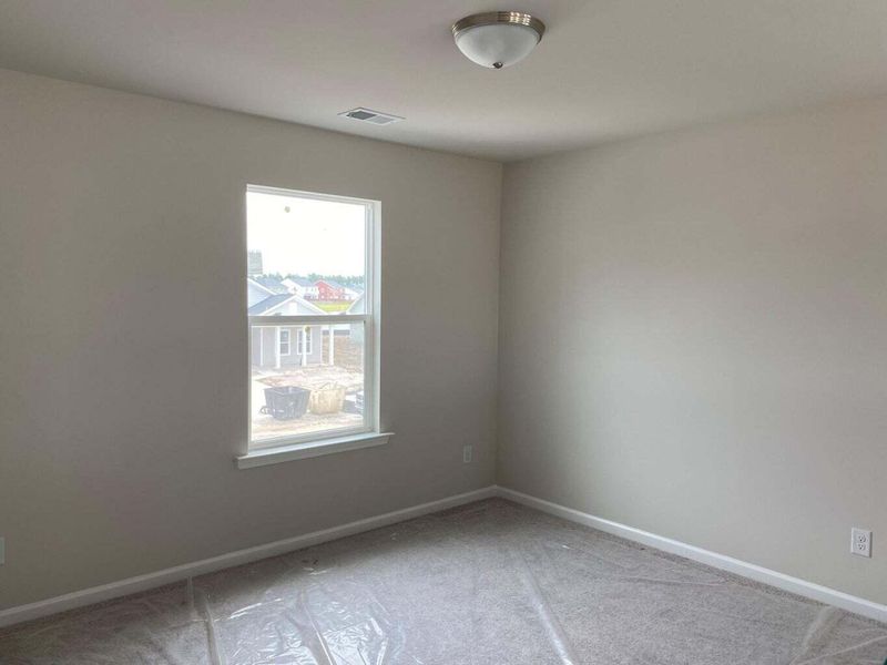 Spacious, unfurnished interior of a new home in Tea Farm: Presidents Series, Ravenel (Image 15).