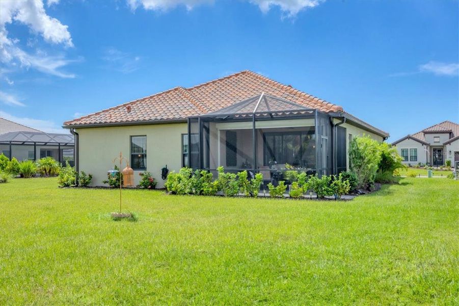 Front exterior of a new home in , Englewood, FL, highlighting curb appeal (Image 23).